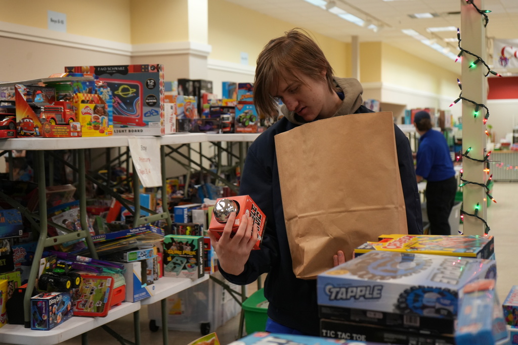A student looking through potential gifts