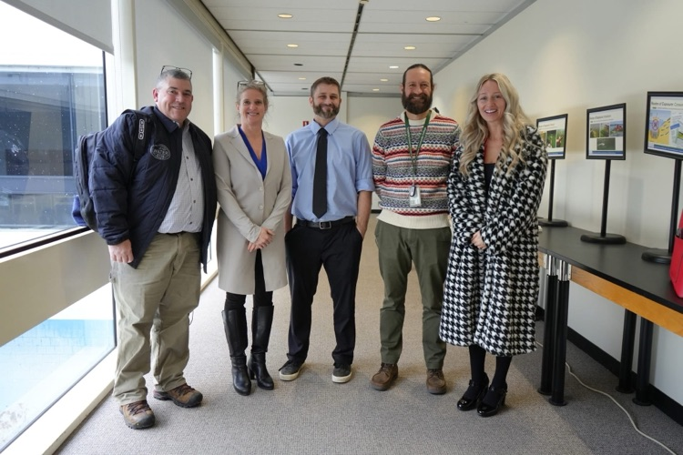 Anna Kelles visits ptech students to discuss HABs. Group poses for a smiling shot all together 