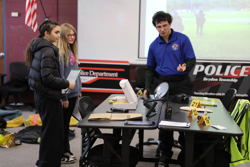 A current student showing potential news students about their program