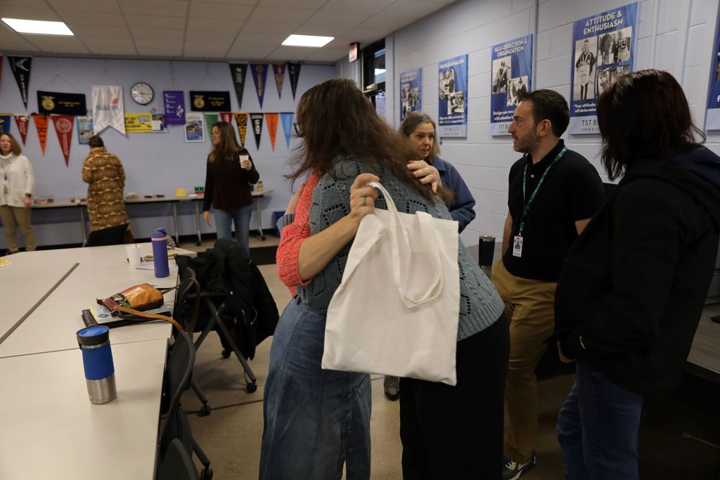 Celebrating Jennifer Hightower, TST's newest National Board Certified Teacher: Jennifer hugging another teacher