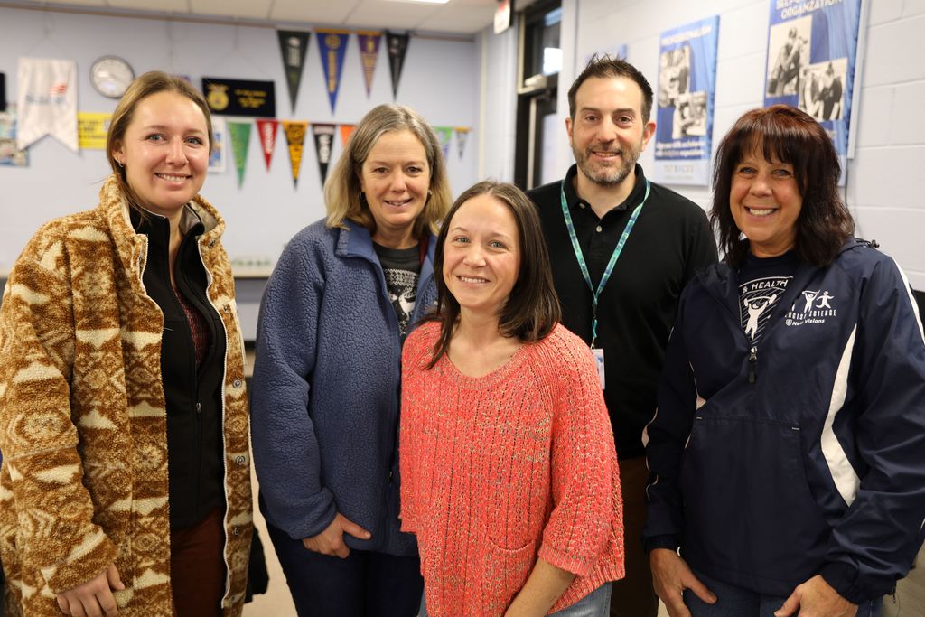 Celebrating Jennifer Hightower, TST's newest National Board Certified Teacher: Jennifer Smiling with other new visions teachers
