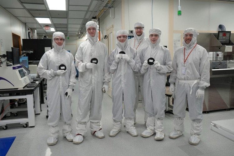 new visions engineering group of students in clean room at Cornell NanoScale Facility