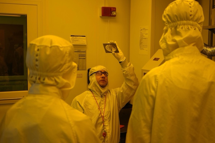 new visions engineering student in clean room at Cornell NanoScale Facility with Tom Pennell