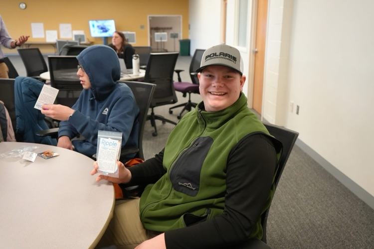 student smiling with Ripple Award