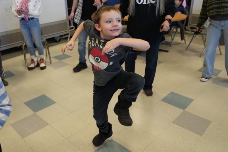  Student smiles and dances at the Smith School Friendship Dance