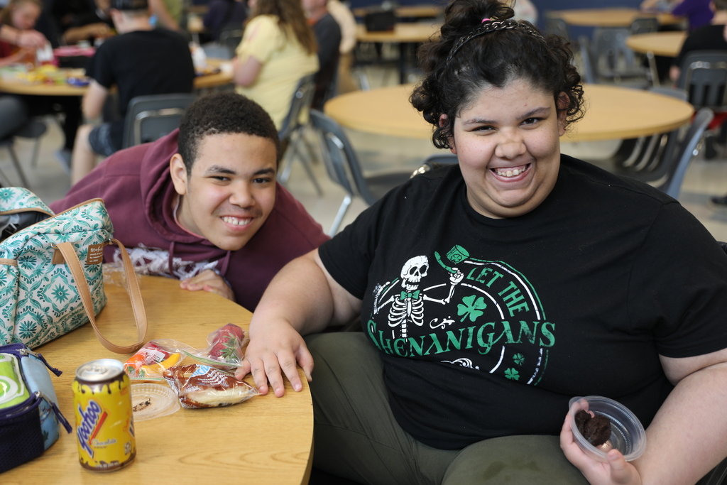 two students posing for the camera