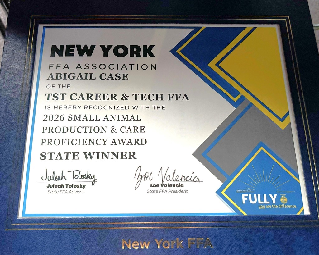 Close-up photo of Abigail Case’s 2026 New York FFA Small Animal Production & Care Proficiency Award State Winner plaque.