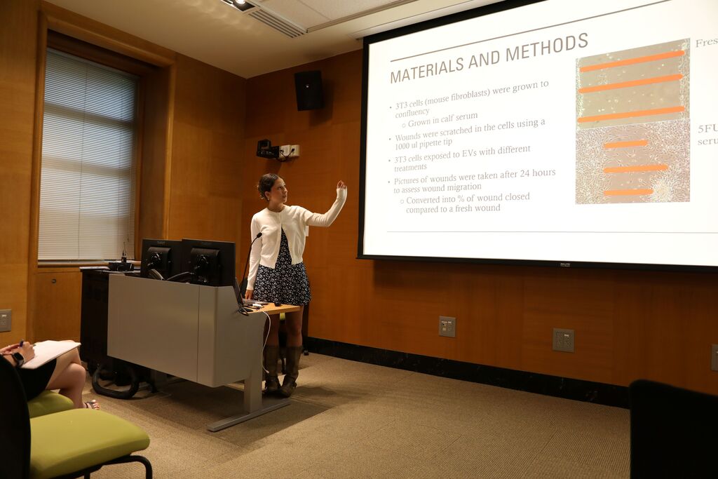 a student presenting to the room