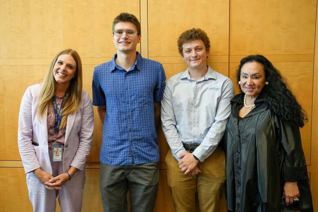 Two former New Visions Engineering students pose with TST BOCES District Superintendent Lily Talcott and New York State Education Commissioner Dr. Betty A. Rosa after sharing their experiences with the program.