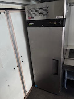 Turbo Air commercial refrigerator installed inside the food trailer as part of the included kitchen equipment.