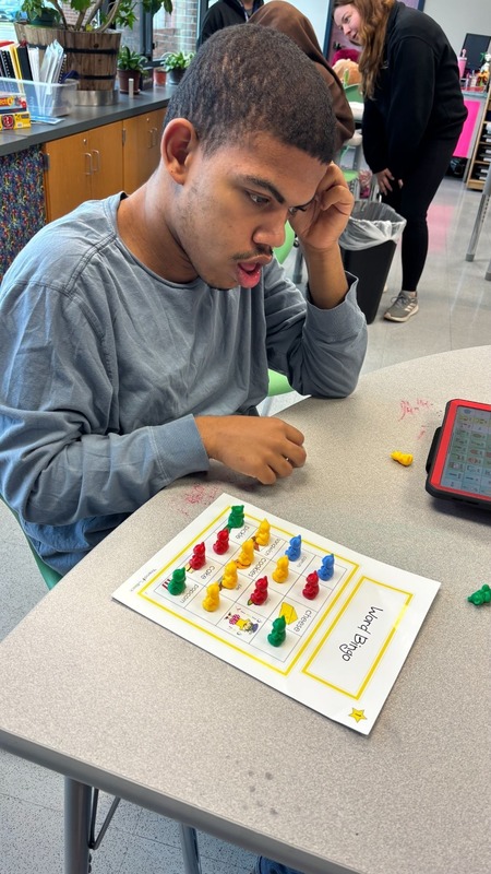 student reading using new literacy program