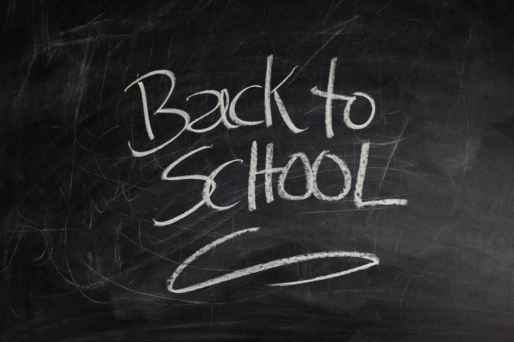 back to school written on a chalkboard