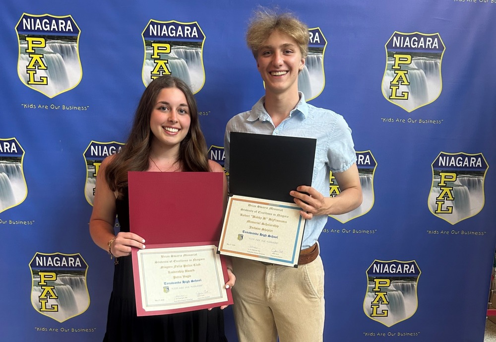 Jackson and Petra pose with their awards.
