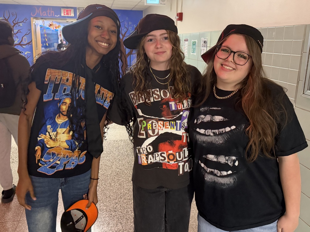 students wear matching hats and shirts for twin day