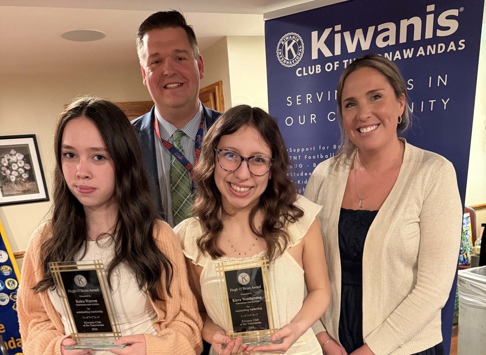 students pose with HOBY awards with assistant principal and superintendent