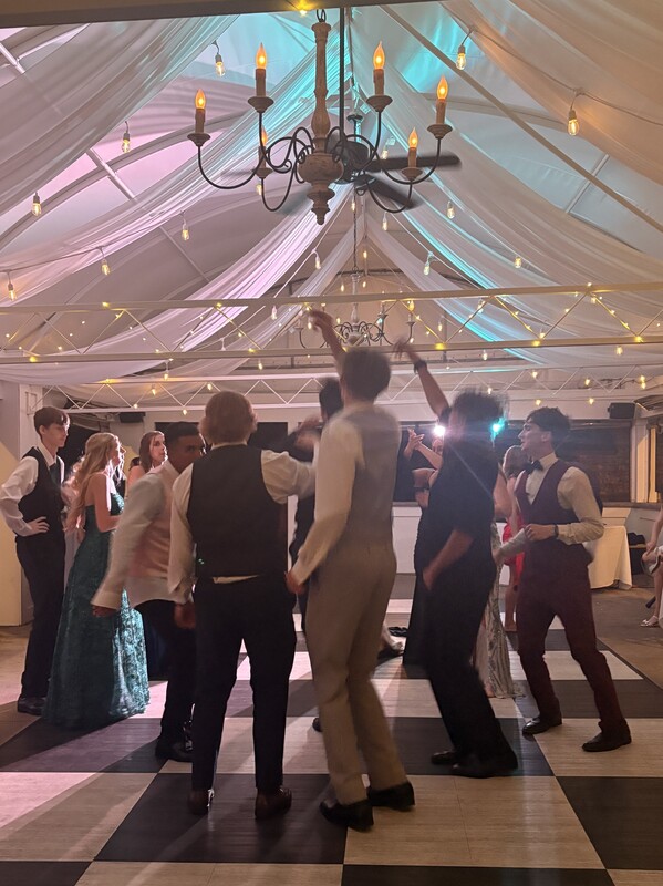 students dancing on dance floor
