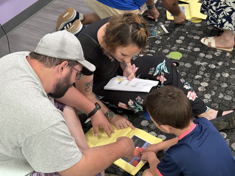 Students and families celebrate Kindergarten students. 