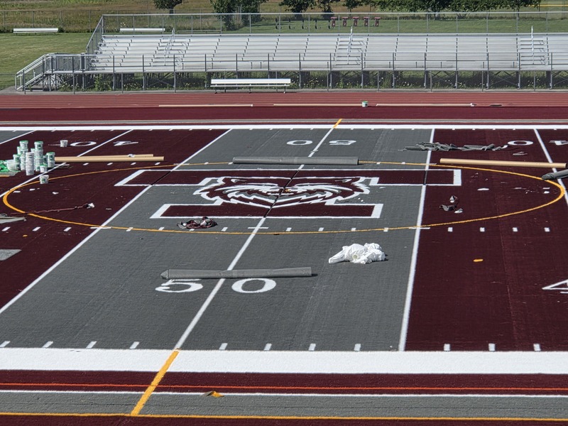 closeup of new logo on the turf