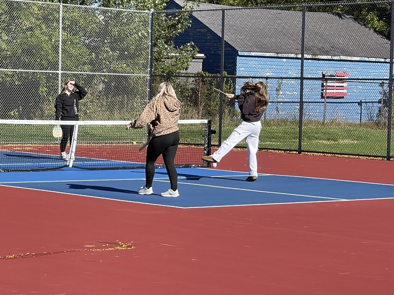 students playing on pickleball court