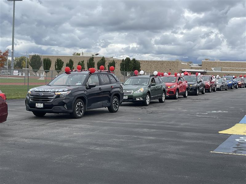 Cars participate in motorcade.