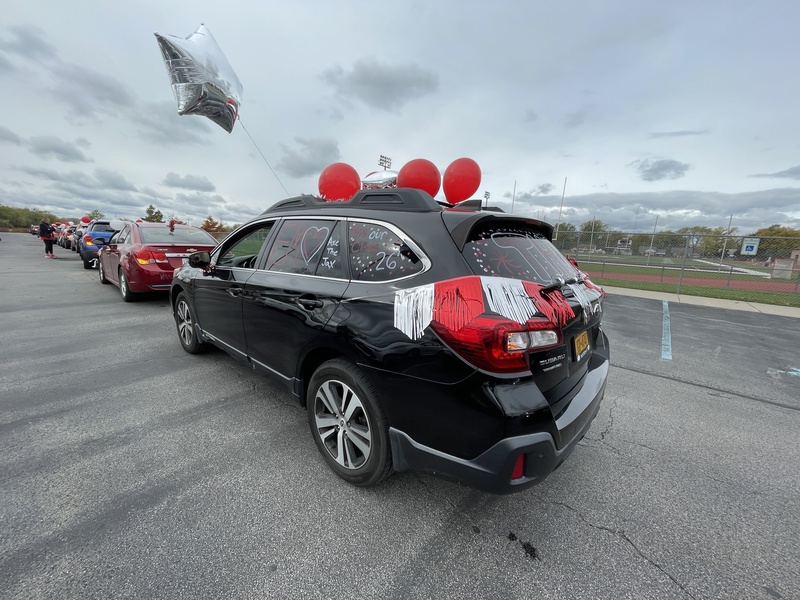 Cars participate in motorcade.