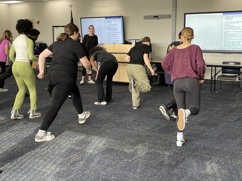 students learn dance together