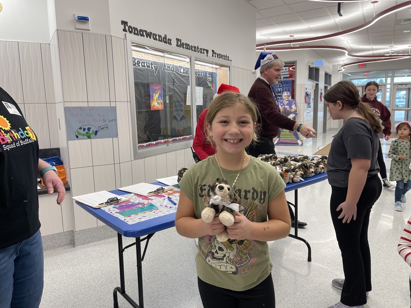 Student receive birthday gifts at TES.