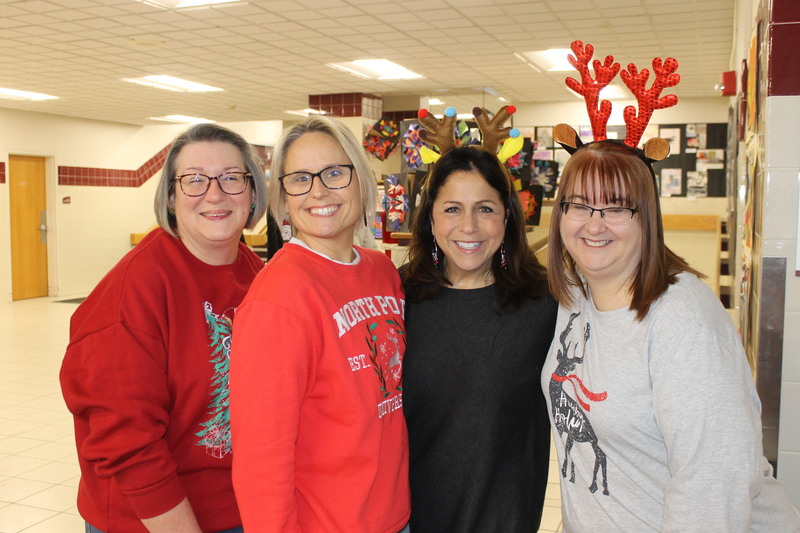 staff pose at christmas for kids