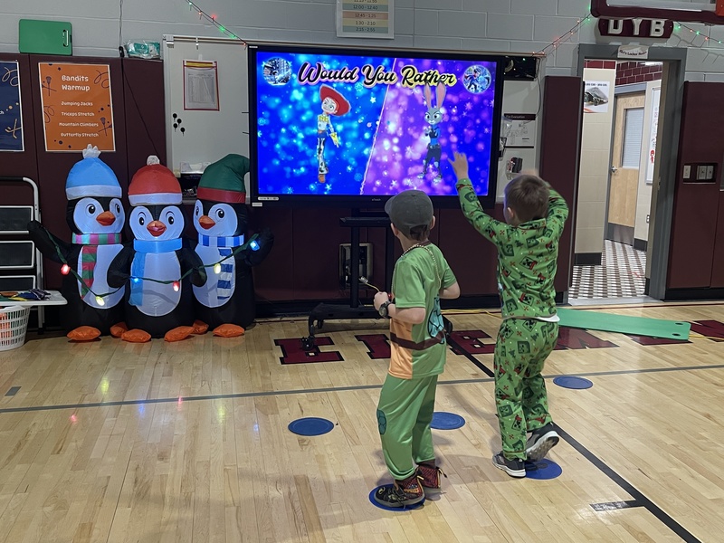 students play just dance in gym class