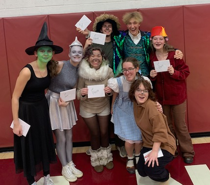 students pose in wizard of oz costume