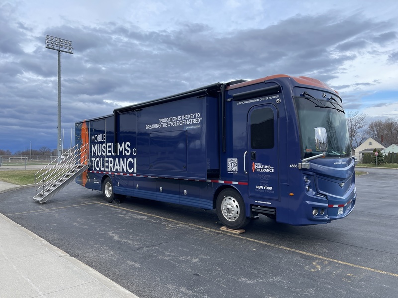 Mobile Museum of tolerance parked outside THS.