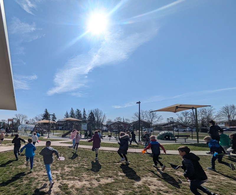 Elementary students participate in Easter Egg Hunt.