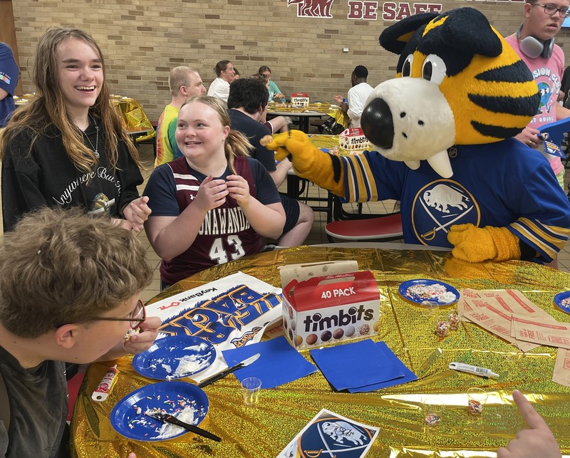 sabretooth goofs around with THS students