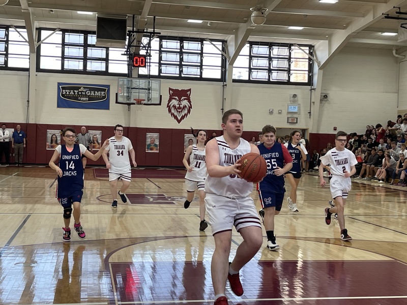 Tonawanda unified basketball player takes a shot on the court