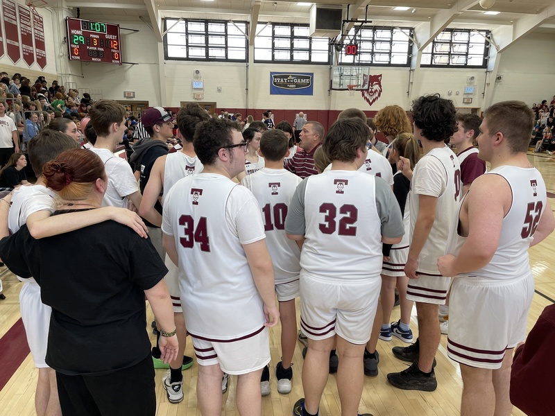 Tonawanda unified basketball team huddles up with coach