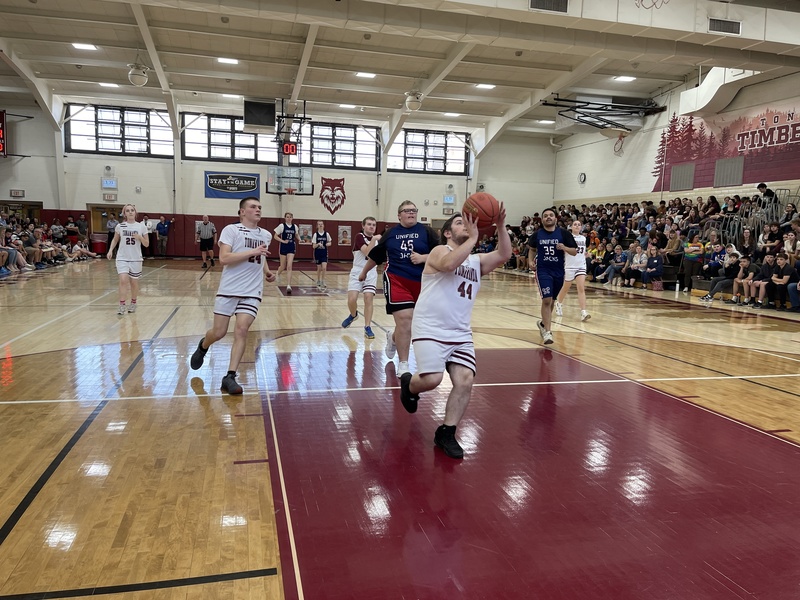 Tonawanda unified basketball player takes a shot on the court