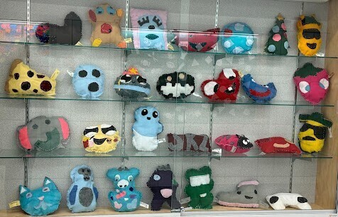 artwork displayed in glass case
