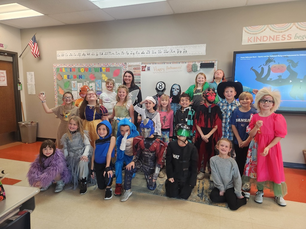 Kids in Halloween costumes