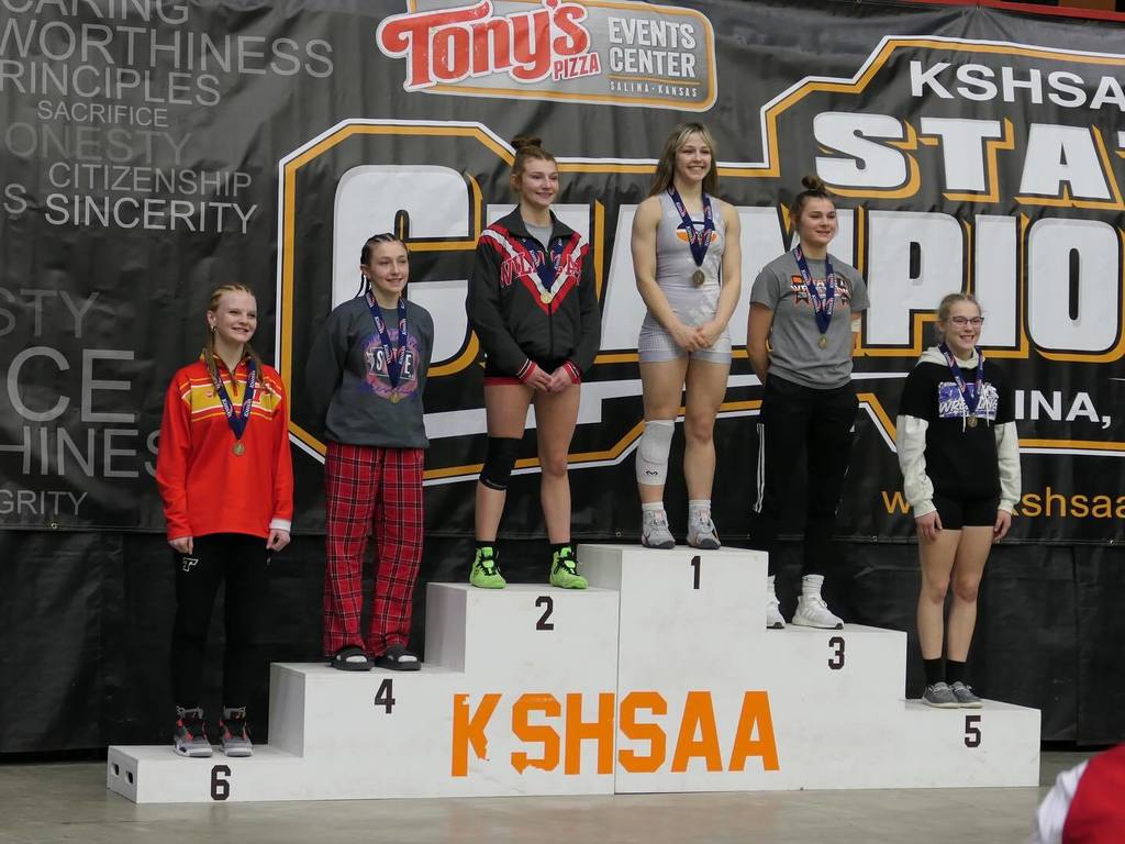 Finley Keller stands on the 6th place stadium spot