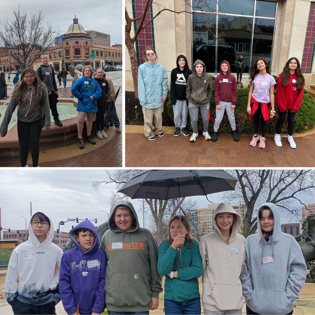 sixth graders standing in front of fountains on the plaza