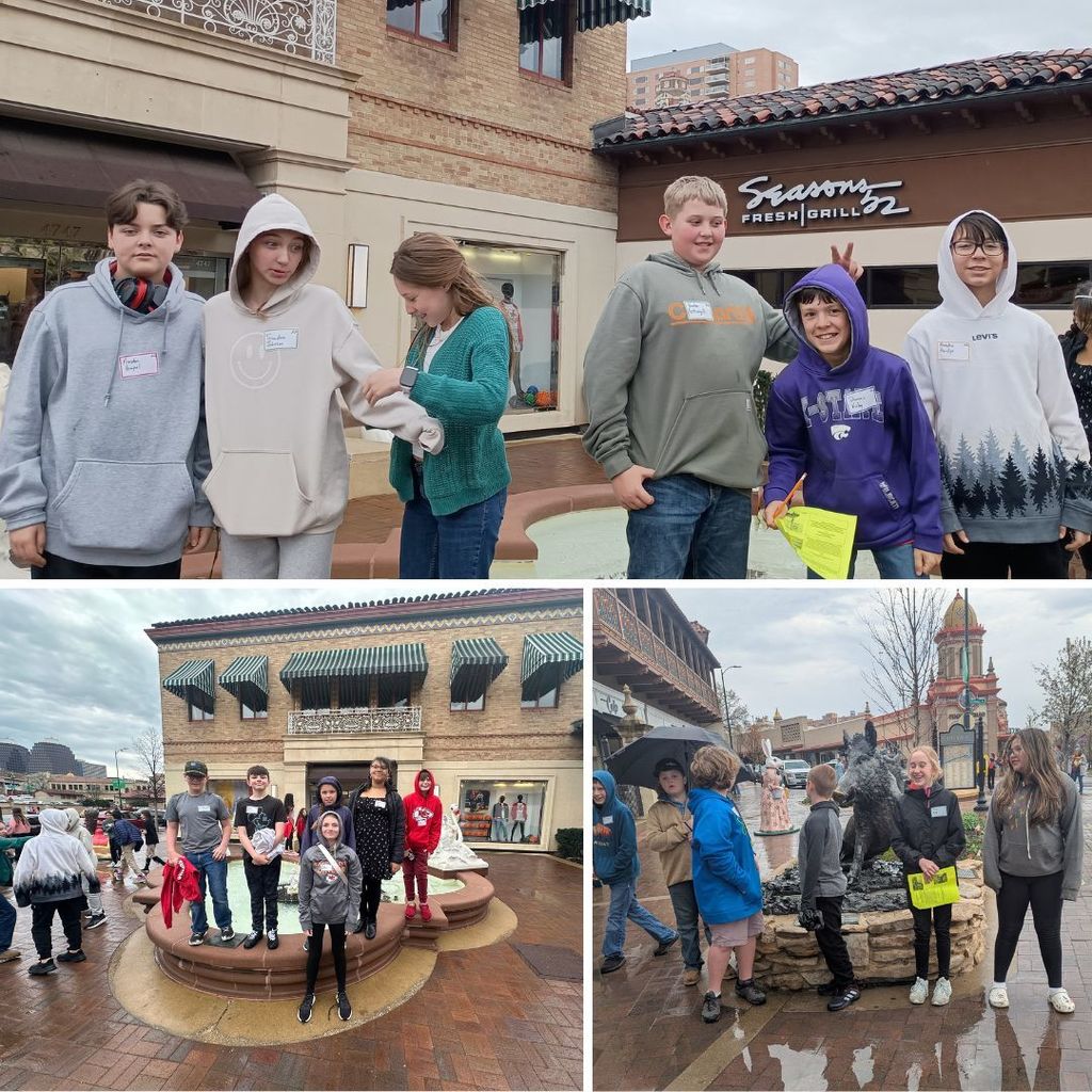 sixth graders standing in front of fountains on the plaza