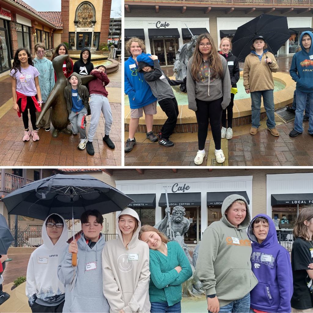 sixth graders standing in front of fountains on the plaza