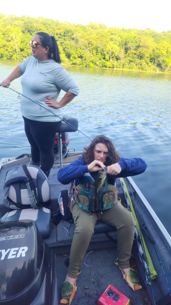 Meagan and Sawyer on a fishing boat