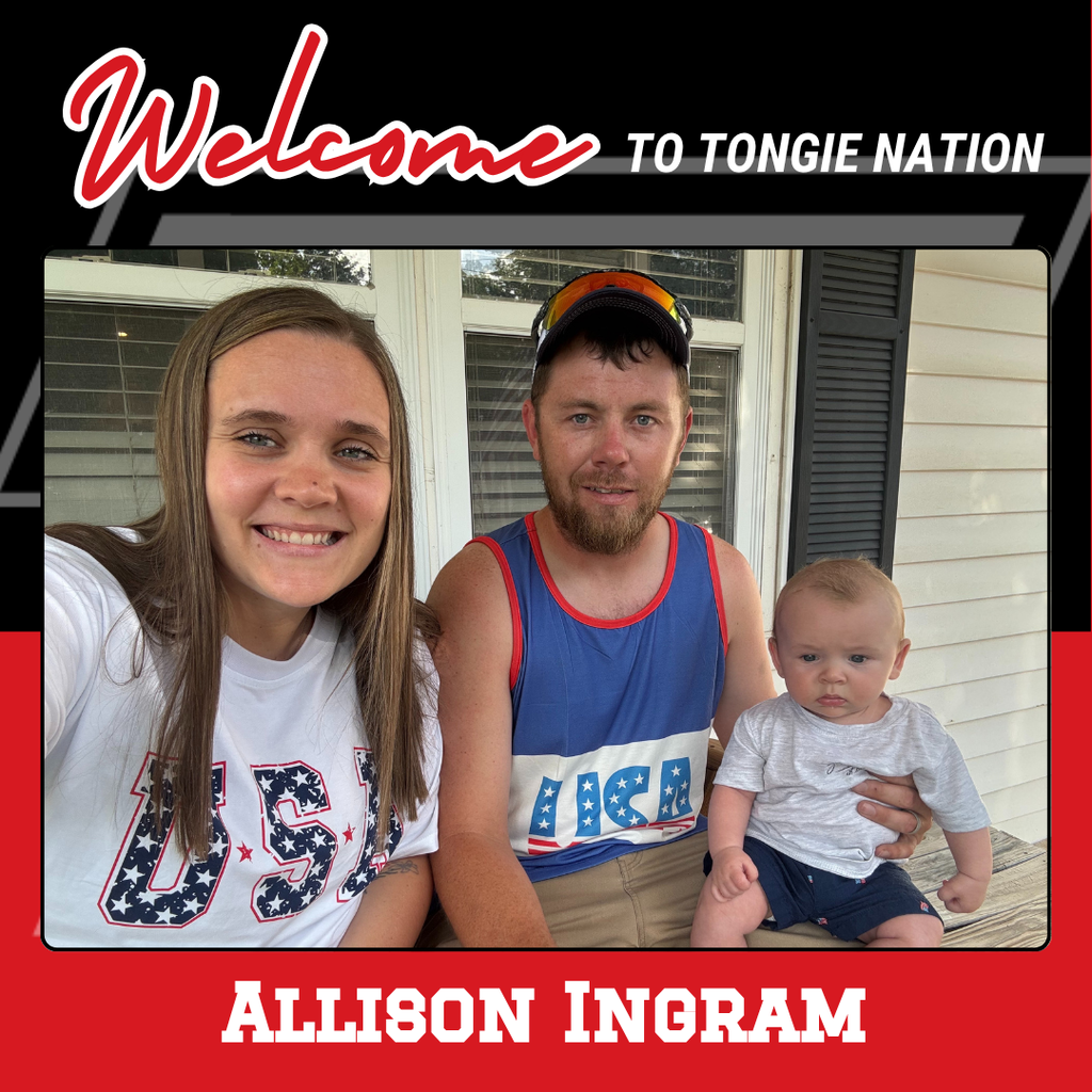 red and black background, allison wearing white t shirt that says USA, Shane wearing blue tank top that says USA, baby Hayes wearing blue shorts and gray tank top