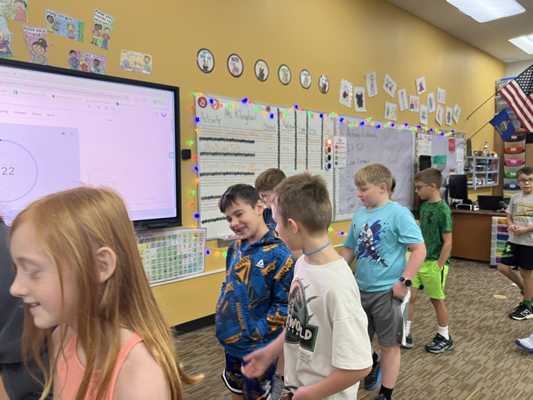 students talking in 3rd Meckler 