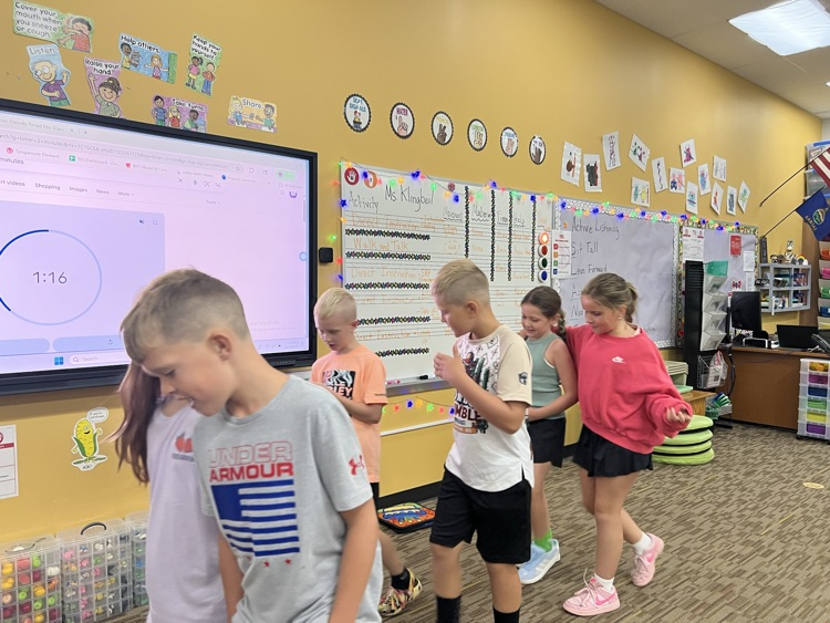 students talking in 3rd Meckler 