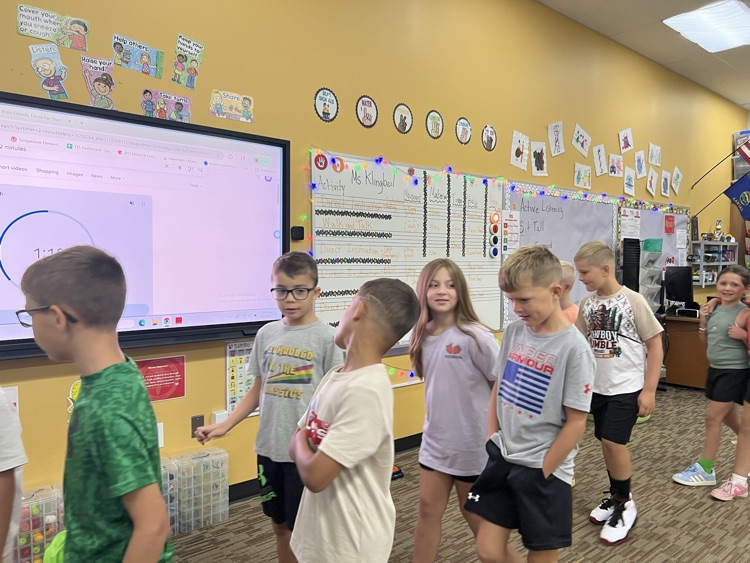 students talking in 3rd Meckler 