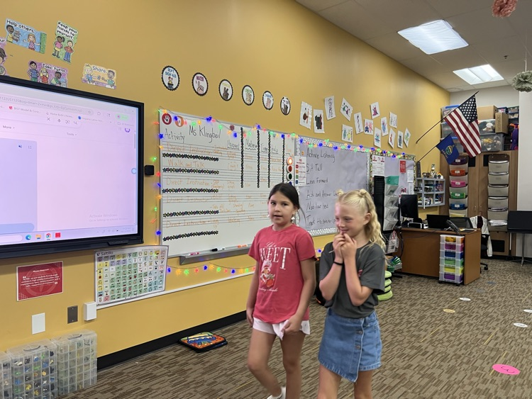 students talking in 3rd Meckler 