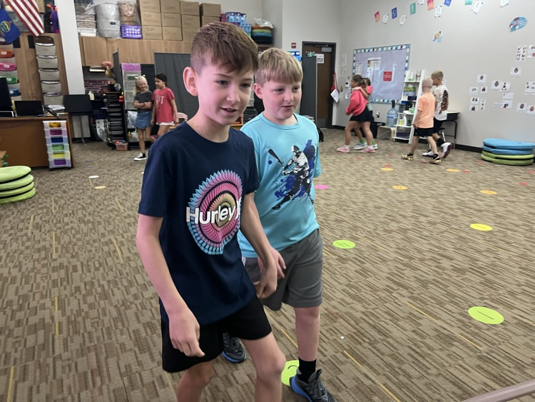 students talking in 3rd Meckler 