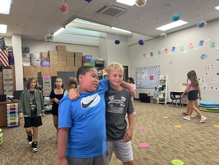 students walking and talking - Mrs. Schaecher 